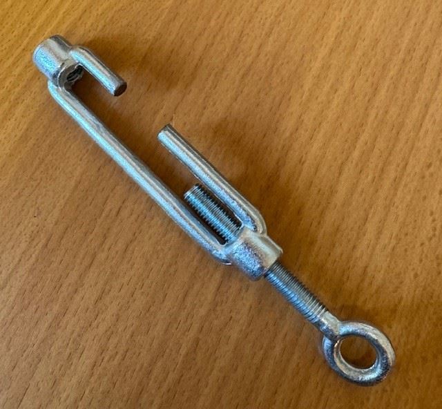 Turnbuckle for tarzan tube guide wire